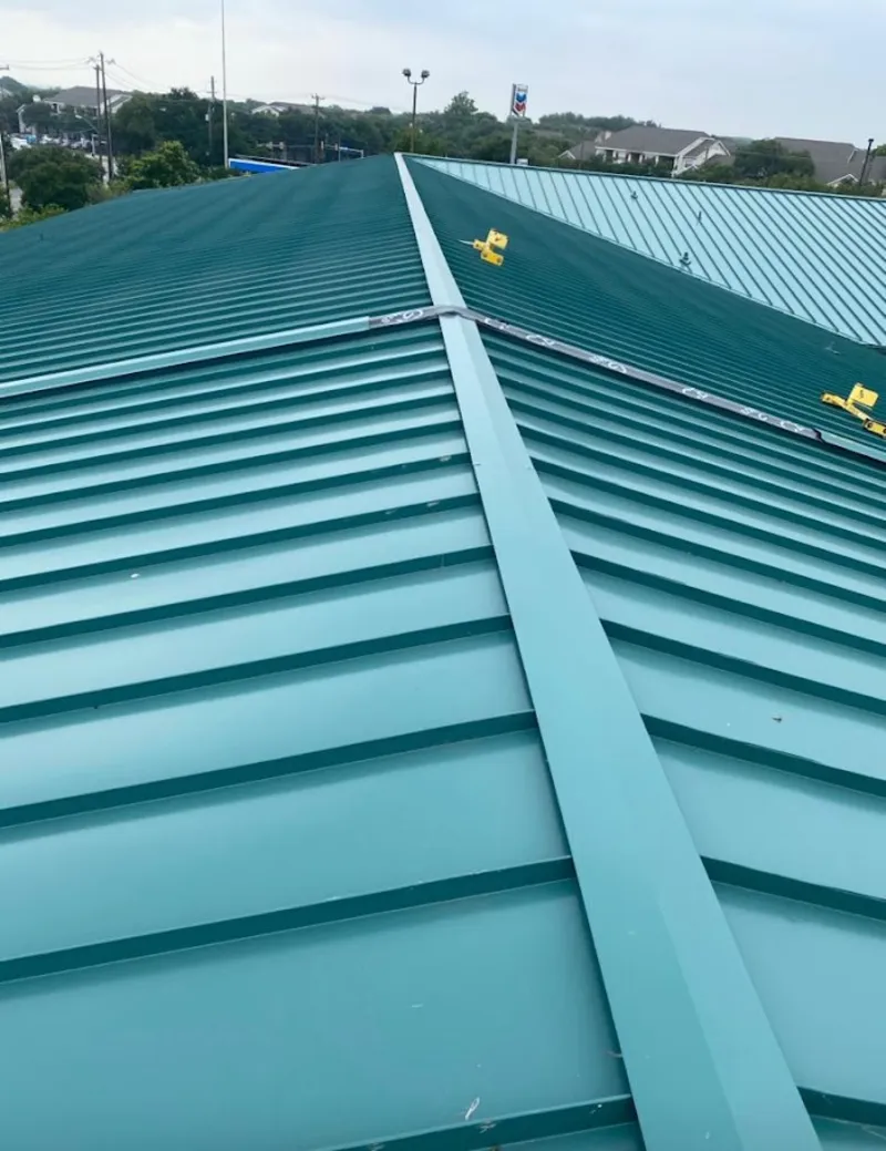 Green commercial metal roof ridge and valley for Metal Roof Repair in Ramsey